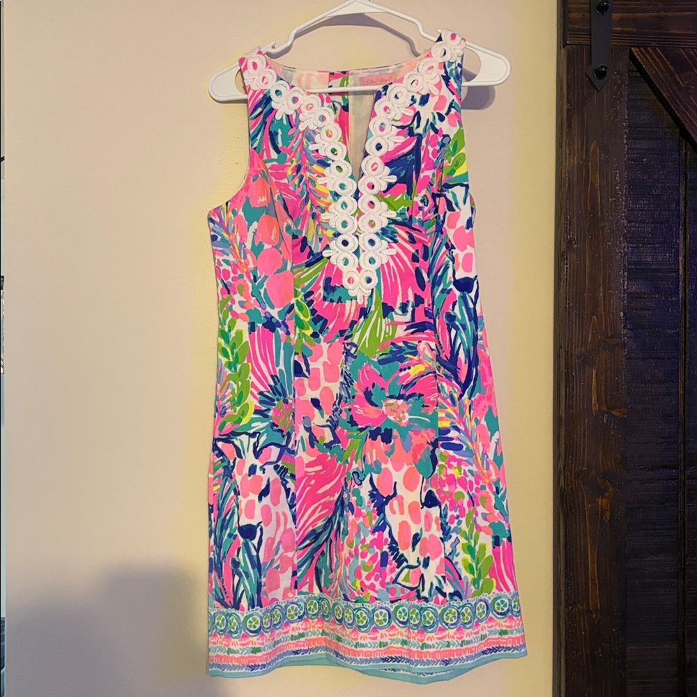 Vibrant Sleeveless Dress with Floral Pattern